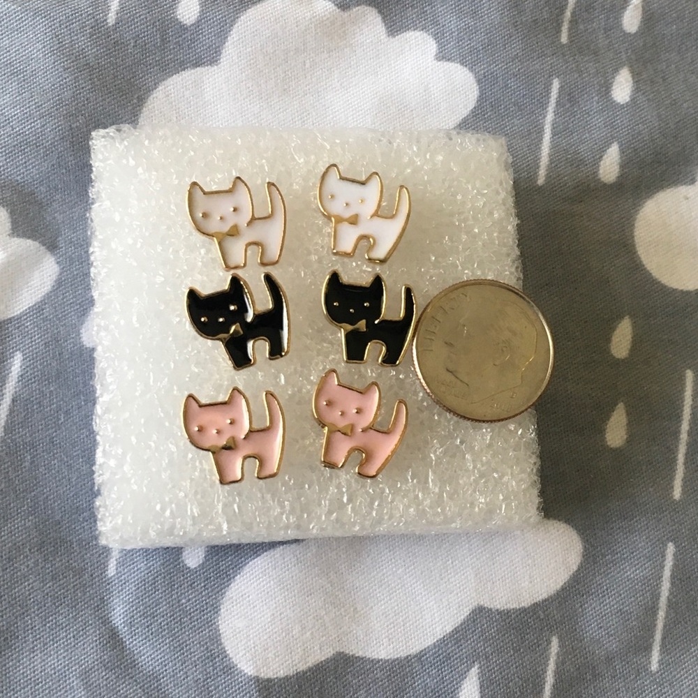 Bow tie wearing cat earrings!